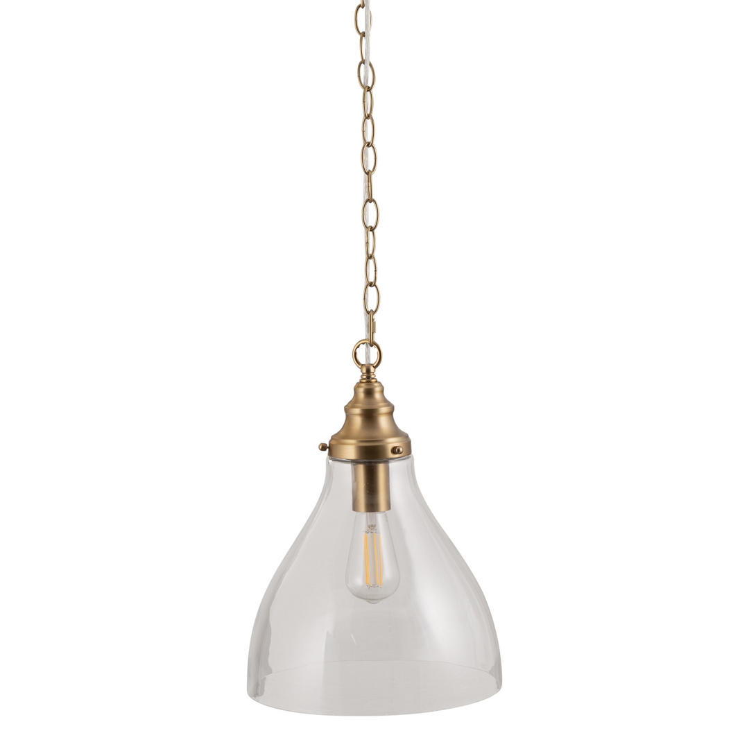 Clear glass pendant light with brass fixture on a white background