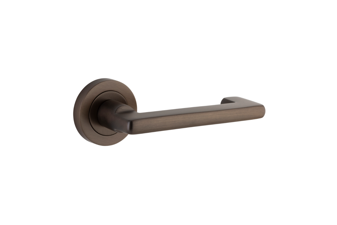 Baltimore Return Lever on Rose Signature Brass
